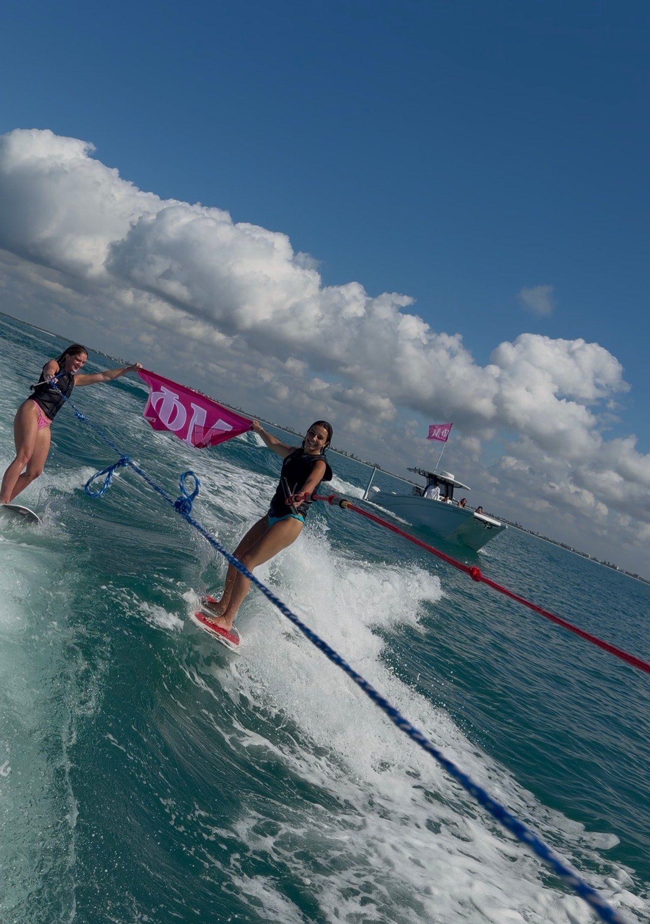 Group of guests wakesurfing